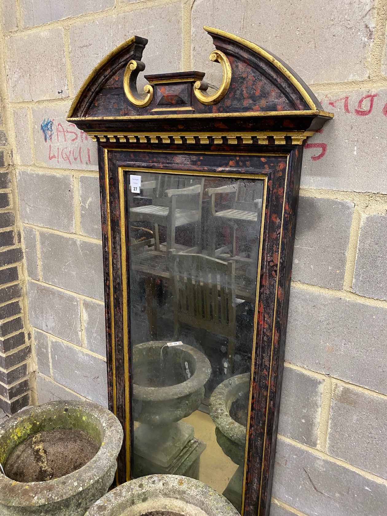 A George II style painted faux tortoiseshell parcel gilt pier glass, width 74cm, height 157cm